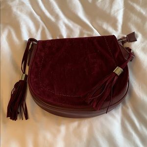 Maroon crossbody purse with tassel